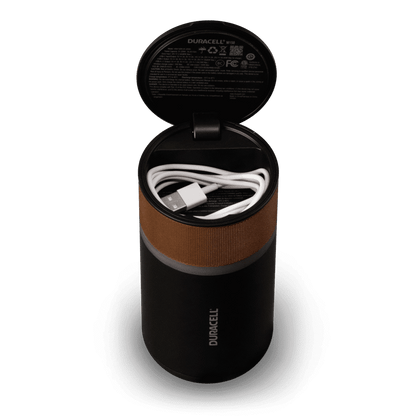 Image of the product with the lid up and cord storage compartment shown.