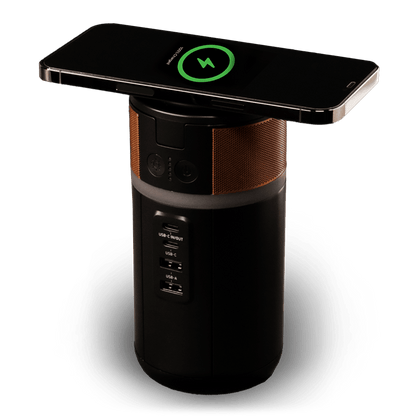 Image of the power station with a phone wirelessly charging on top.