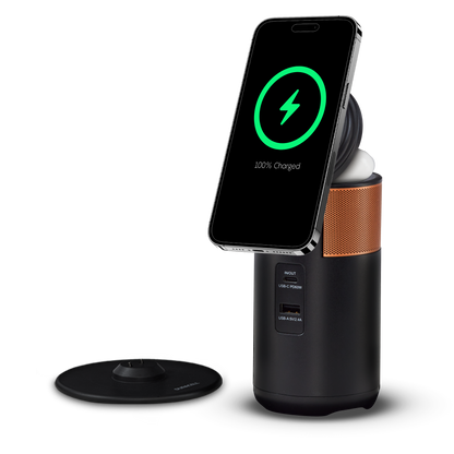 M100 charger wirelessly charging a phone on the magnetic lid